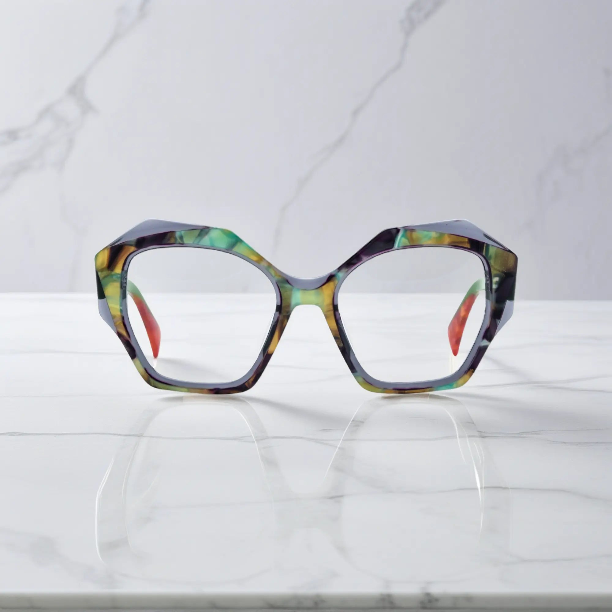 Front view of VoyueLens™ Forest Marble eyeglasses featuring a polygonal frame and rich green-acetate color blend.